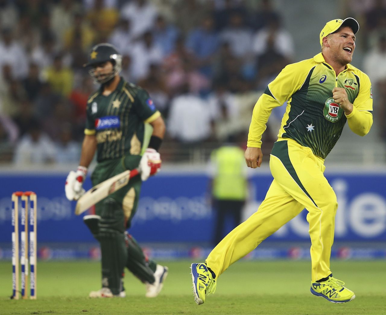 Aaron Finch takes off after taking a catch at first slip, Pakistan v Australia, only T20I, Dubai, October 5, 2014