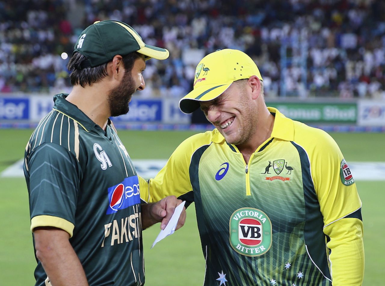 Aaron Finch and Shahid Afridi share a joke before the start, Pakistan v Australia, only T20I, Dubai, October 5, 2014