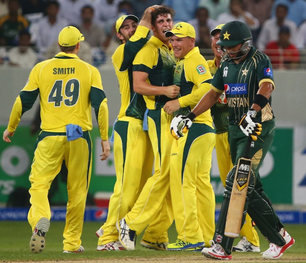 Sean Abbott is mobbed after dismissing Shahid Afridi, Pakistan v Australia, only T20I, Dubai, October 5, 2014