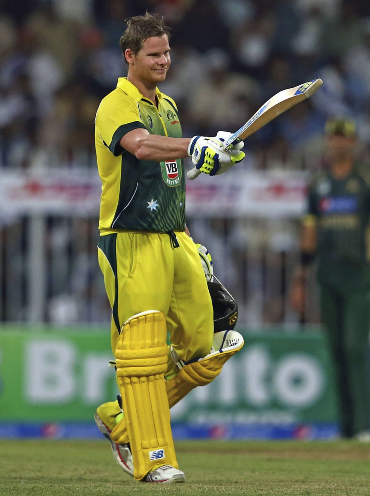 Steven Smith raises his bat after scoring his maiden ODI century, Pakistan v Australia, 1st ODI, Sharjah, October 7, 2014