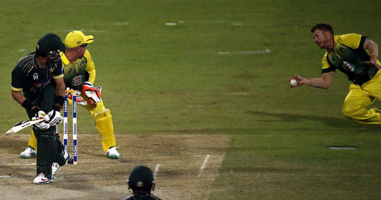 David Warner dives to catch Misbah-ul-Haq at leg slip, Pakistan v Australia, 1st ODI, Sharjah, October 7, 2014