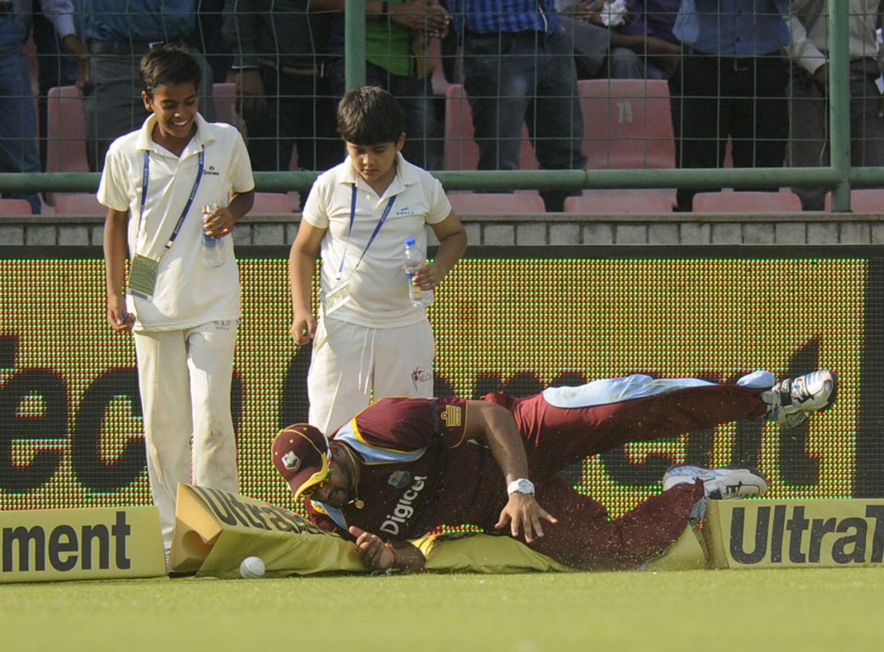 Ravi Rampaul dives in an attempt to stop a boundary, India v West Indies, 2nd ODI, Delhi, October 11, 2014