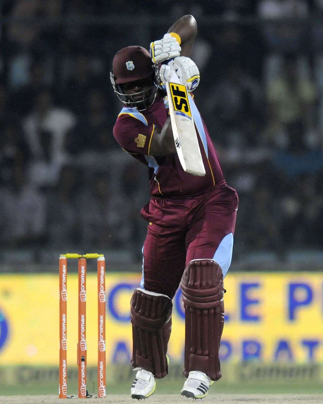 Dwayne Smith drives down the ground off his toes, India v West Indies, 2nd ODI, Delhi, October 11, 2014