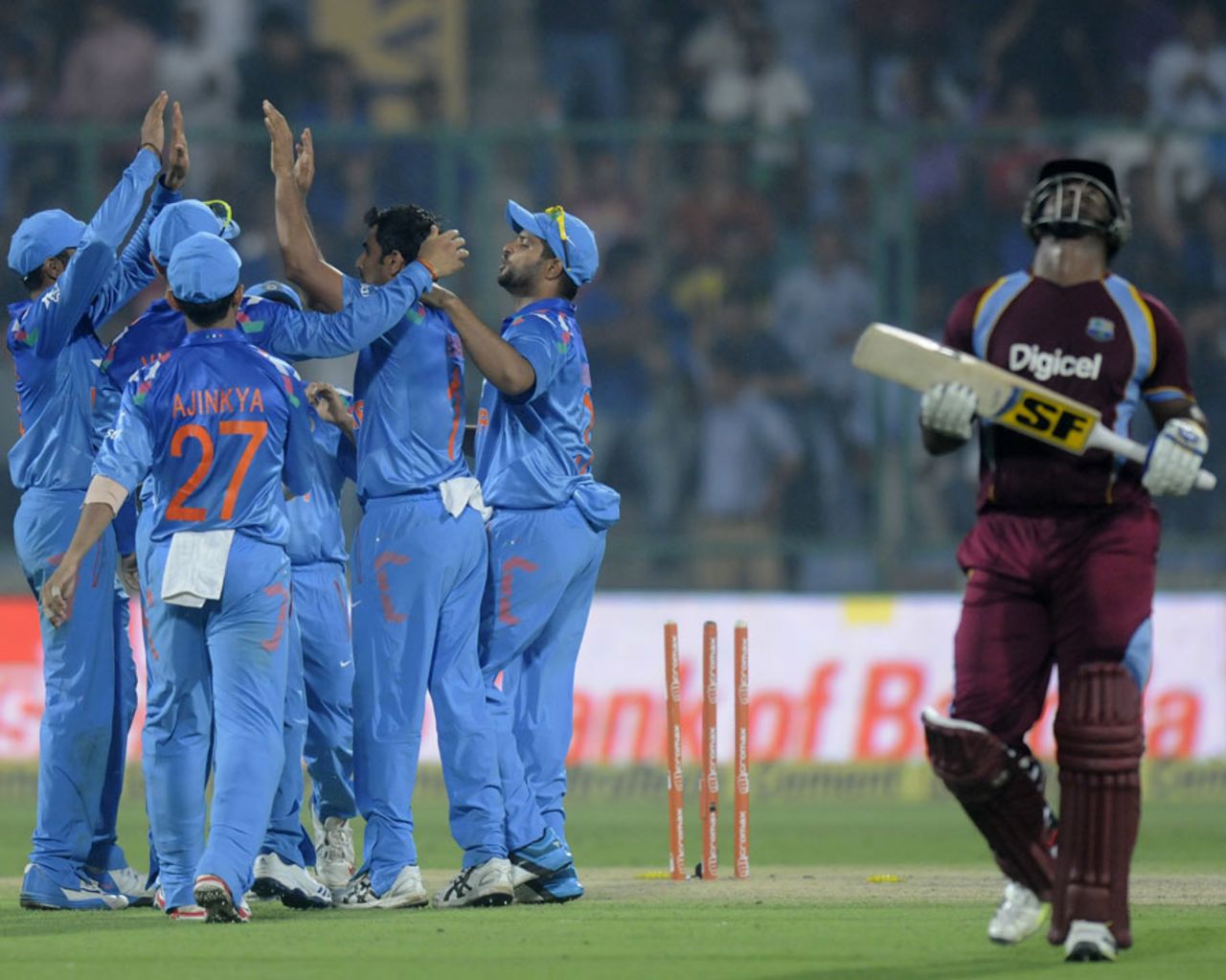 A despondent Dwayne Smith walks back after falling for 97, India v West Indies, 2nd ODI, Delhi, October 11, 2014