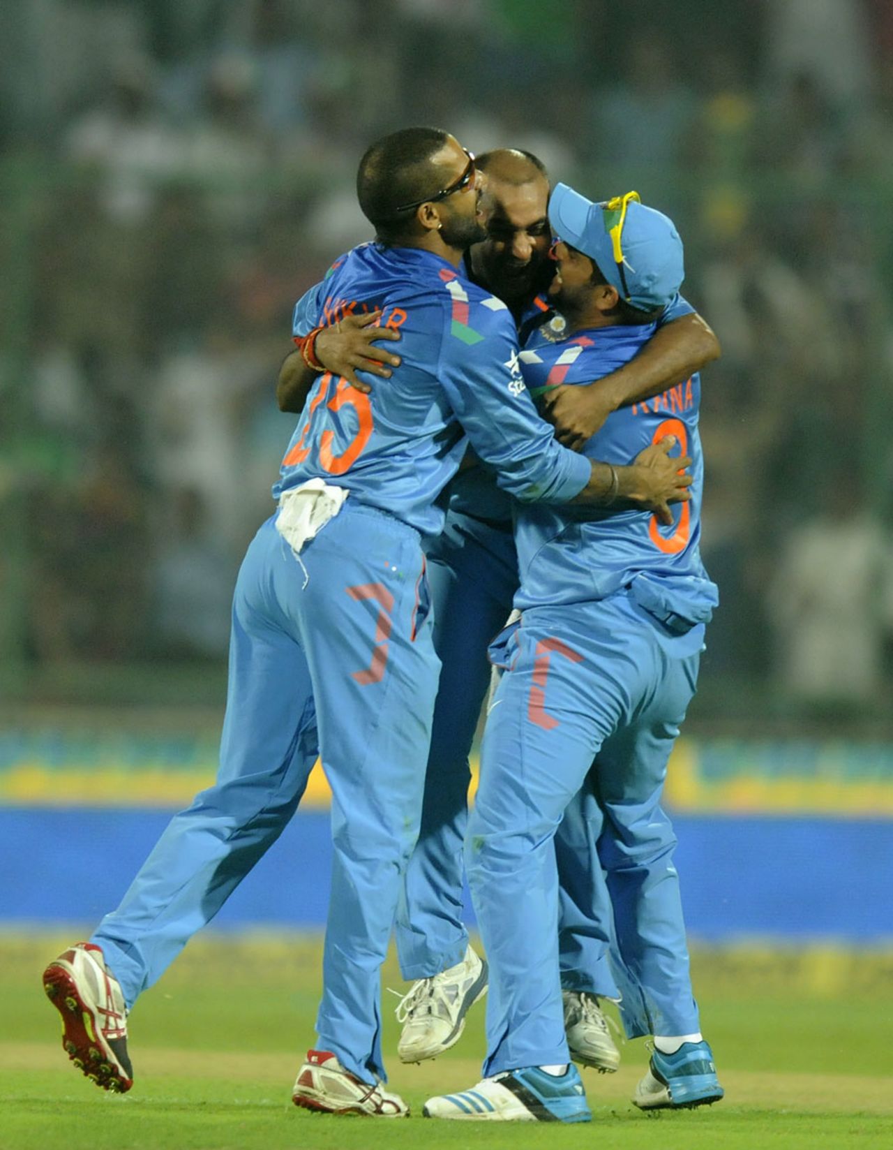 Amit Mishra gets locked in an embrace after collecting a wicket, India v West Indies, 2nd ODI, Delhi, October 11, 2014
