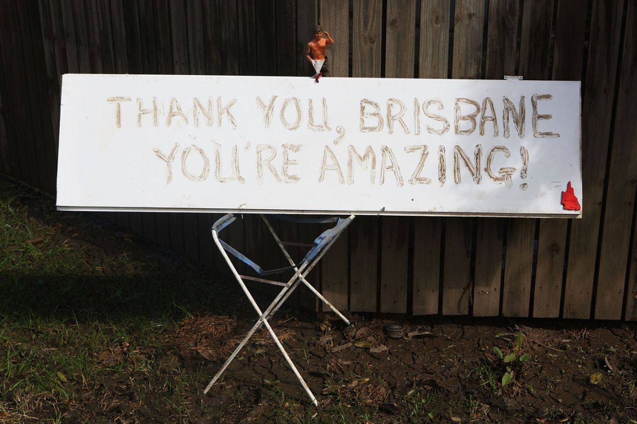 A sign in mud outside a home in the St Lucia suburb in Brisbane as the recovery work after the floods begins, Brisbane, January 20, 2011