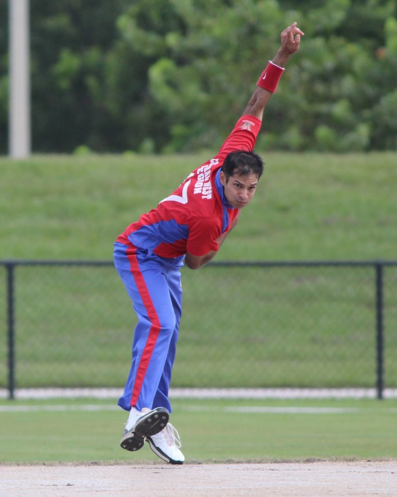Usman Shuja sends one down to a North East batsman, Central West v North East, USACA T20 National Championship, Lauderhill, August 16, 2014