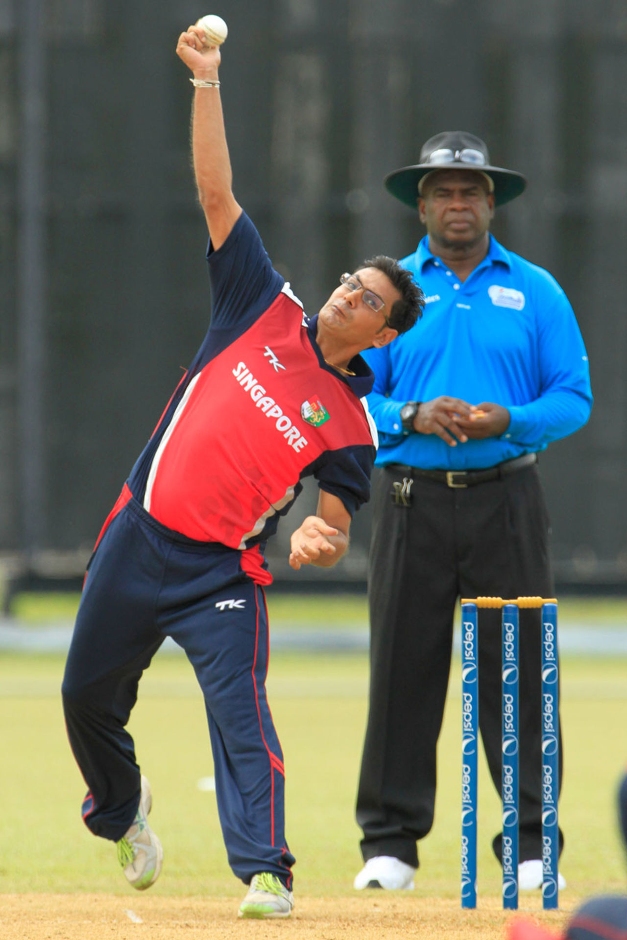 Mulewa Dharmichand picked up 3 for 27, Malaysia v Singapore, ICC World Cricket League Division Three, Kuala Lumpur, October 23, 2014
