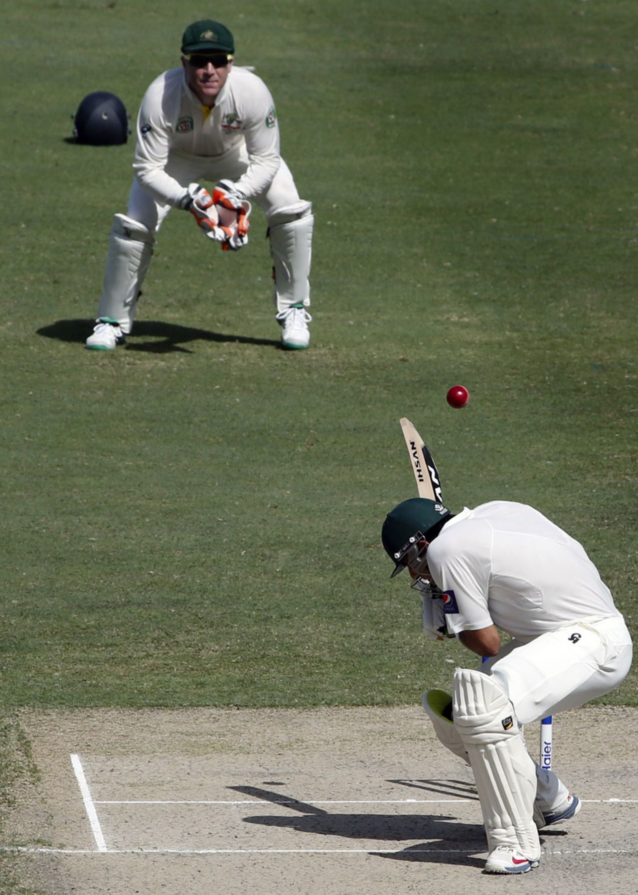 Misbah-ul-Haq evades a short ball, Pakistan v Australia, 1st Test, Dubai, 2nd day, October 23, 2014