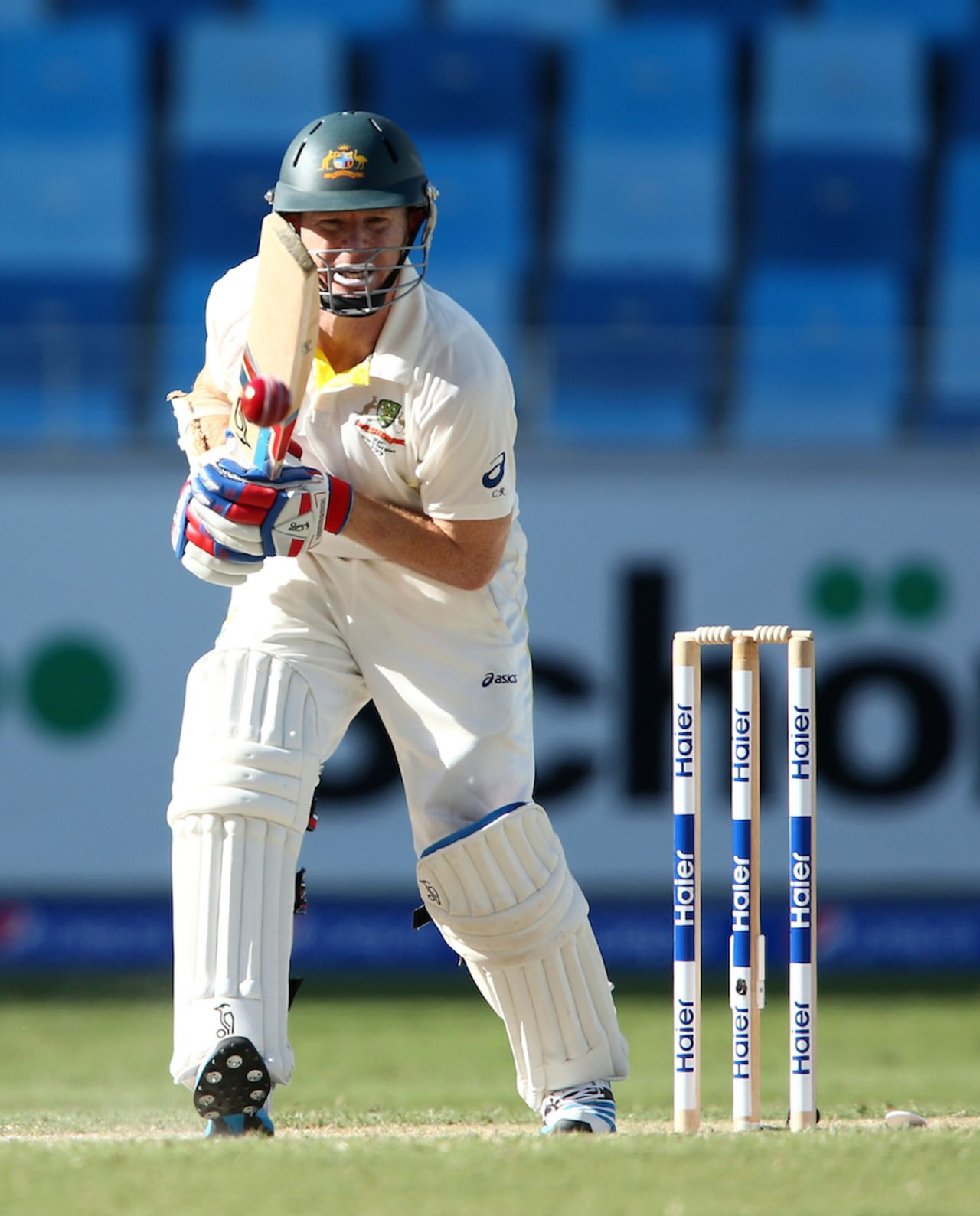 Chris Rogers pushes the ball on the off side, Pakistan v Australia, 1st Test, Dubai, 2nd day, October 23, 2014