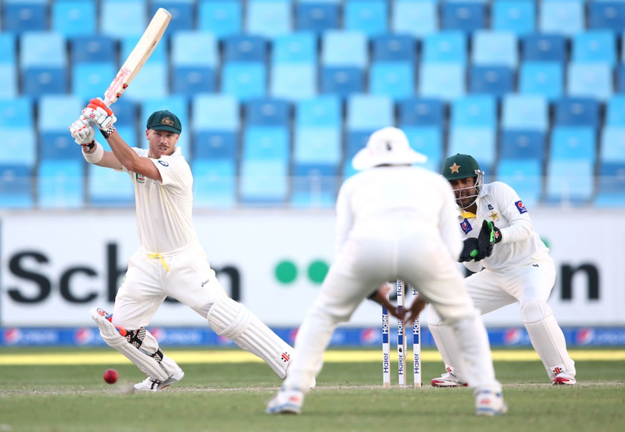 David Warner punches the ball on the off side, Pakistan v Australia, 1st Test, Dubai, 2nd day, October 23, 2014
