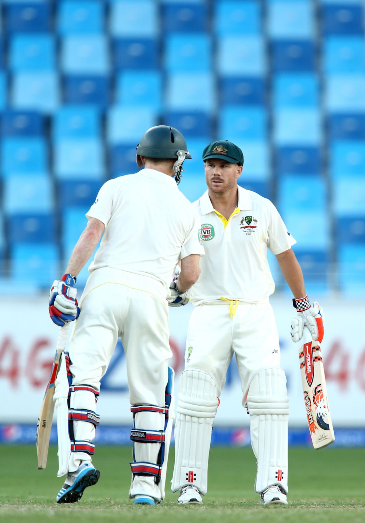 Nice to meet you: Chris Rogers congratulates David Warner for his fifty, Pakistan v Australia, 1st Test, Dubai, 2nd day, October 23, 2014