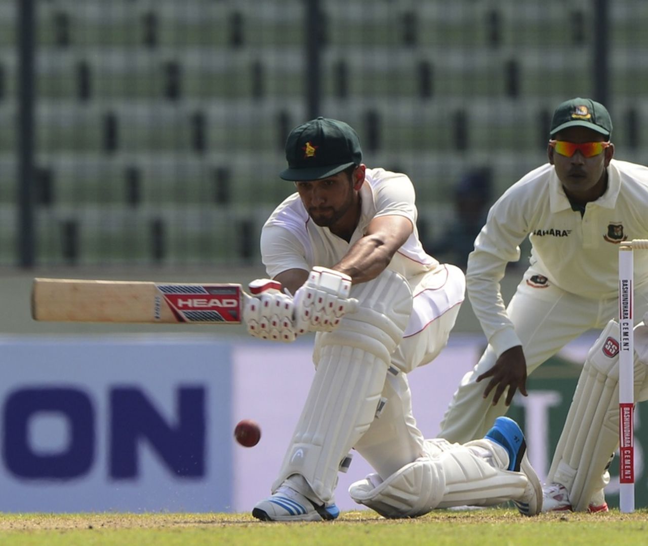 Sikandar Raza plays the sweep, Bangladesh v Zimbabwe, 1st Test, Mirpur, 1st day, October 25, 2014