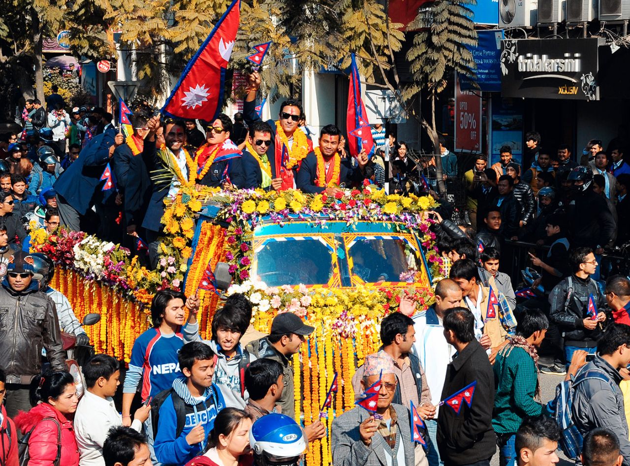The Nepal players get a heroes' welcome after qualifying for the World T20 2014, Kathmandu, December 4, 2013