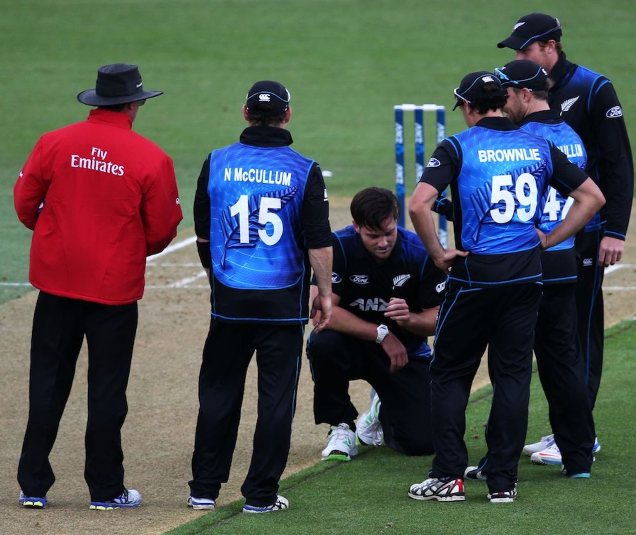 Mitchell McClenaghan nurses a sore finger after hitting the stumps while bowling, New Zealand v South Africa, 3rd ODI, Hamilton, October 27, 2014
