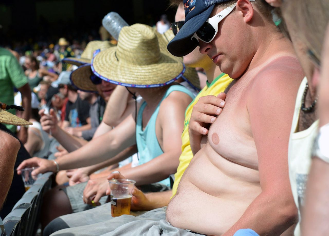 A spectator gets his tan on, Australia v Sri Lanka, 2nd Test, Melbourne, 2nd day, December 27, 2012