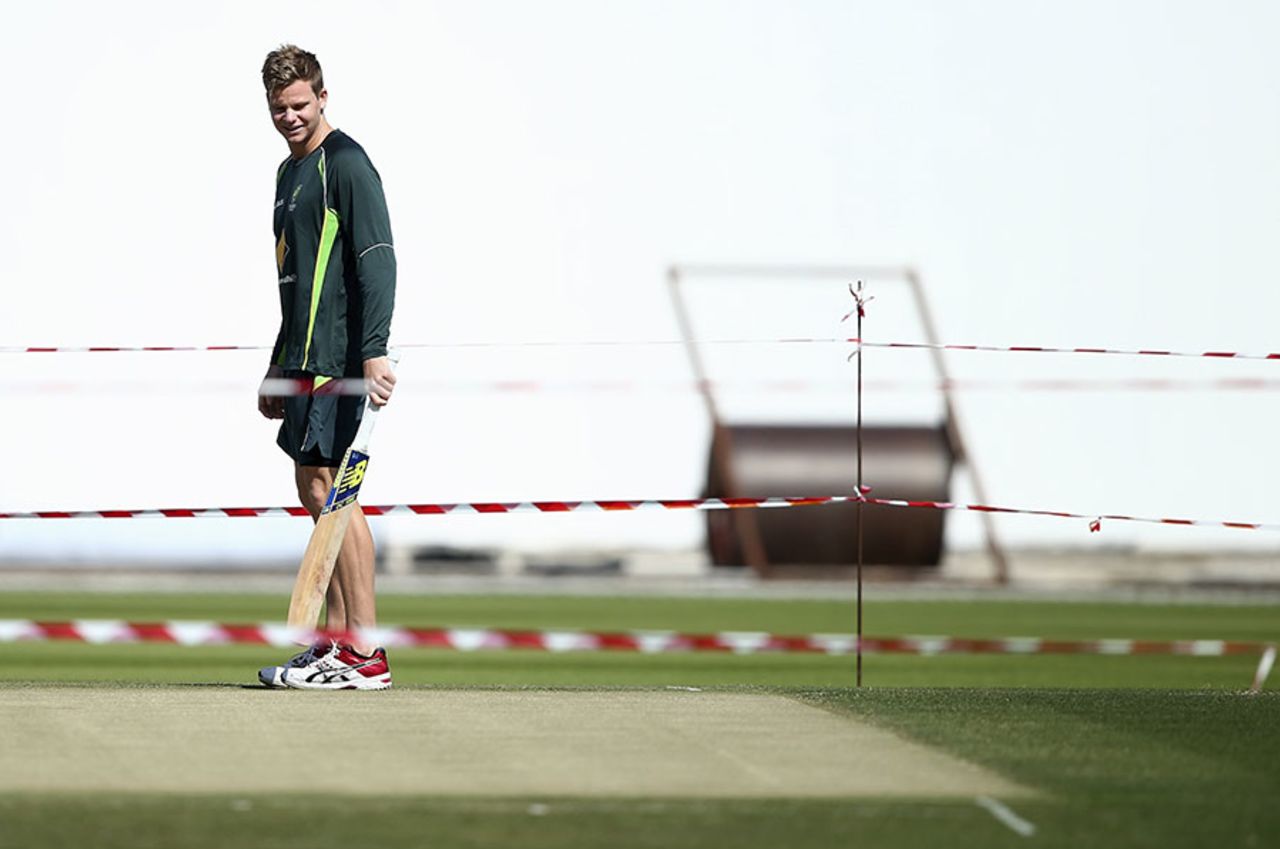 Steven Smith has a look at the pitch at the Sheikh Zayed Stadium, Abu Dhabi, October 28, 2014
