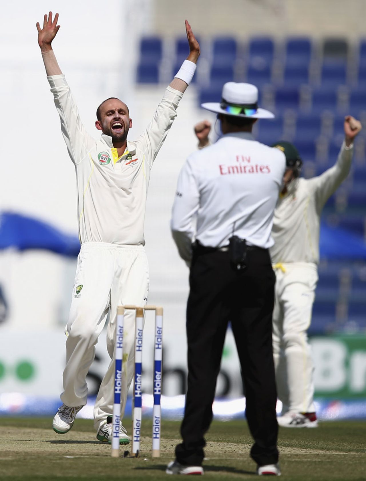 Nathan Lyon lets out a celebratory roar after trapping Ahmed Shehzad, Pakistan v Australia, 2nd Test, Abu Dhabi, 1st day, October 30, 2014