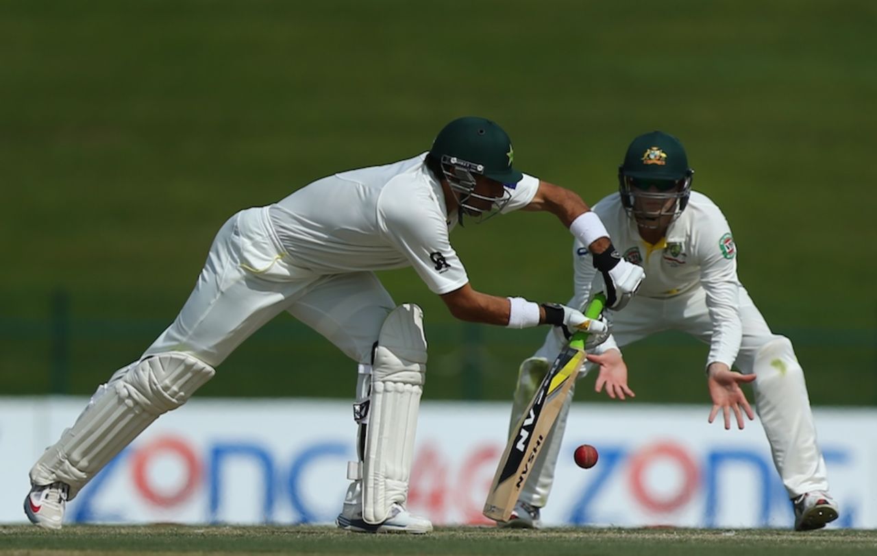 Misbah-ul-Haq fends the ball on the leg side, Pakistan v Australia, 2nd Test, Abu Dhabi, 2nd day, October 31, 2014