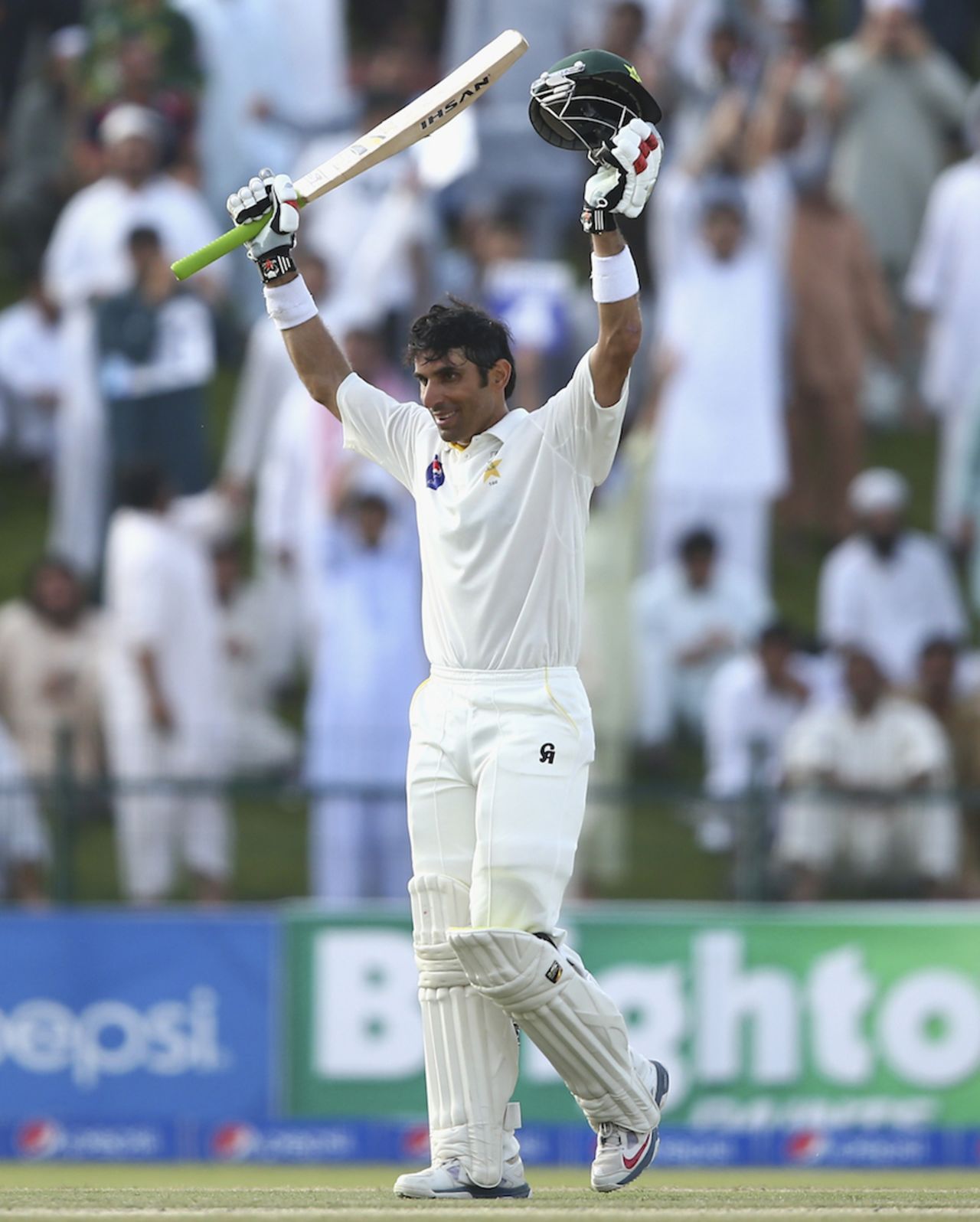 Misbah-ul-Haq acknowledges the crowd after his hundred, Pakistan v Australia, 2nd Test, Abu Dhabi, 2nd day, October 31, 2014