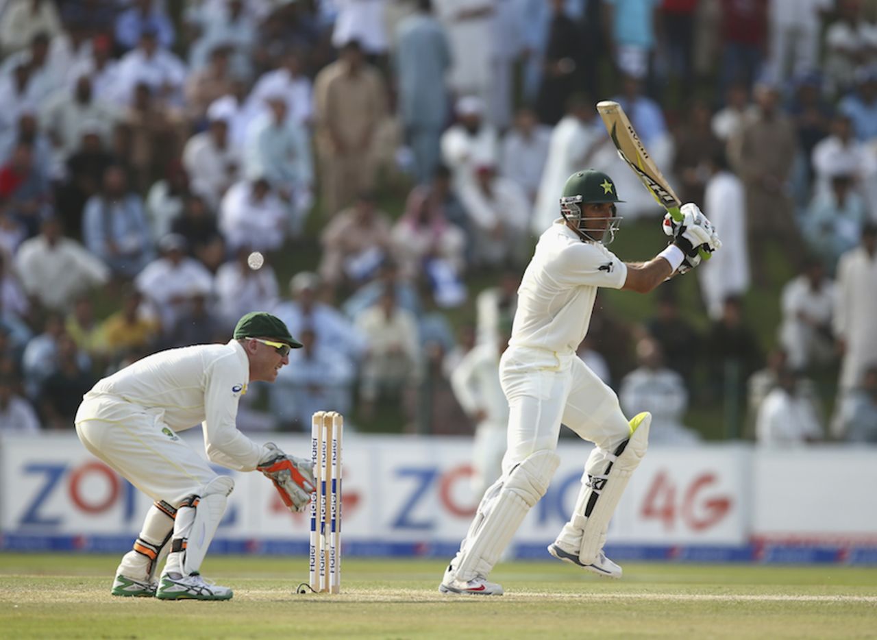 Misbah-ul-Haq punches one of the back foot, Pakistan v Australia, 2nd Test, Abu Dhabi, 2nd day, October 31, 2014