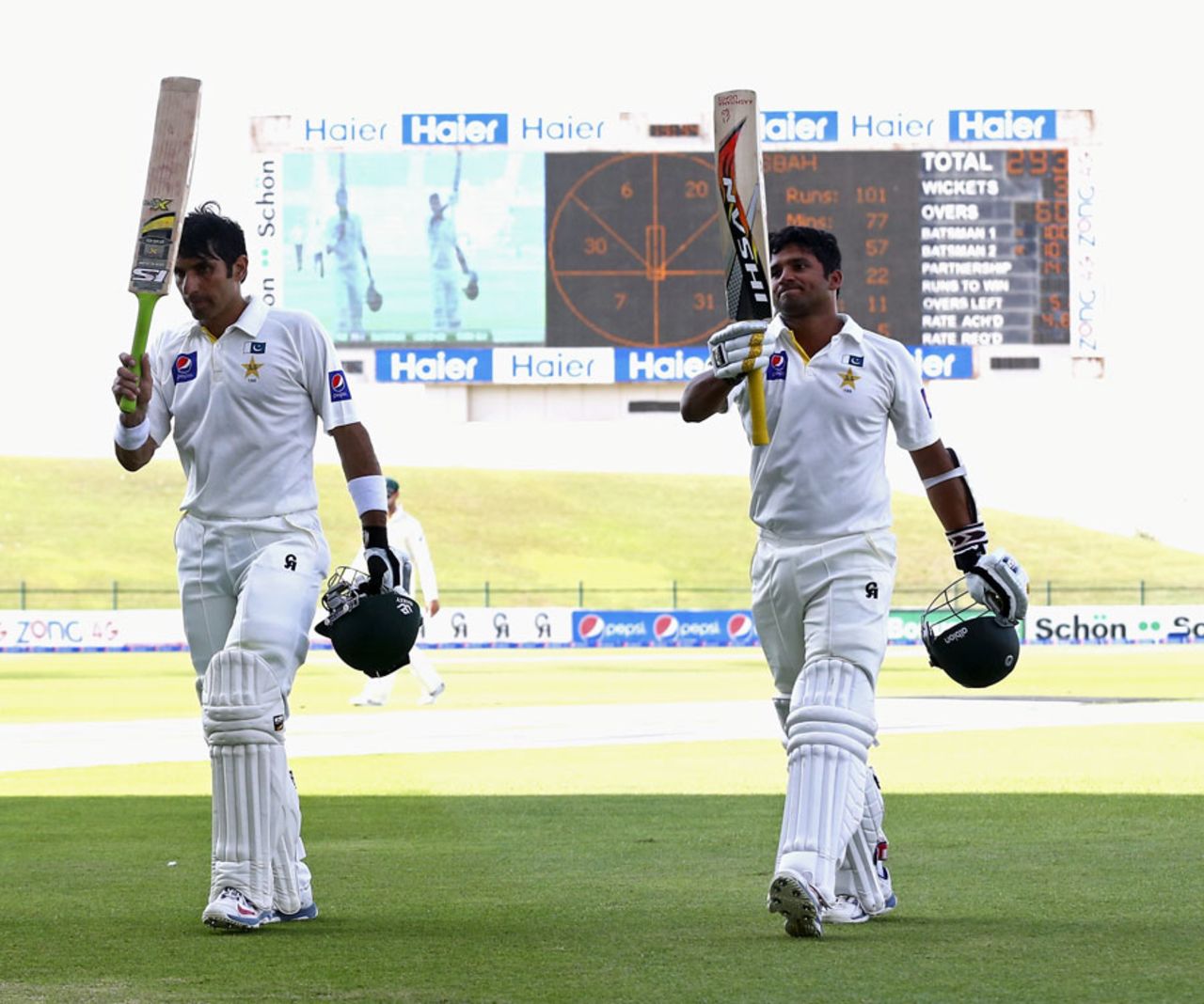 Misbah-ul-Haq and Azhar Ali walk off after scoring tons, Pakistan v Australia, 2nd Test, Abu Dhabi, 4th day, November 2, 2014