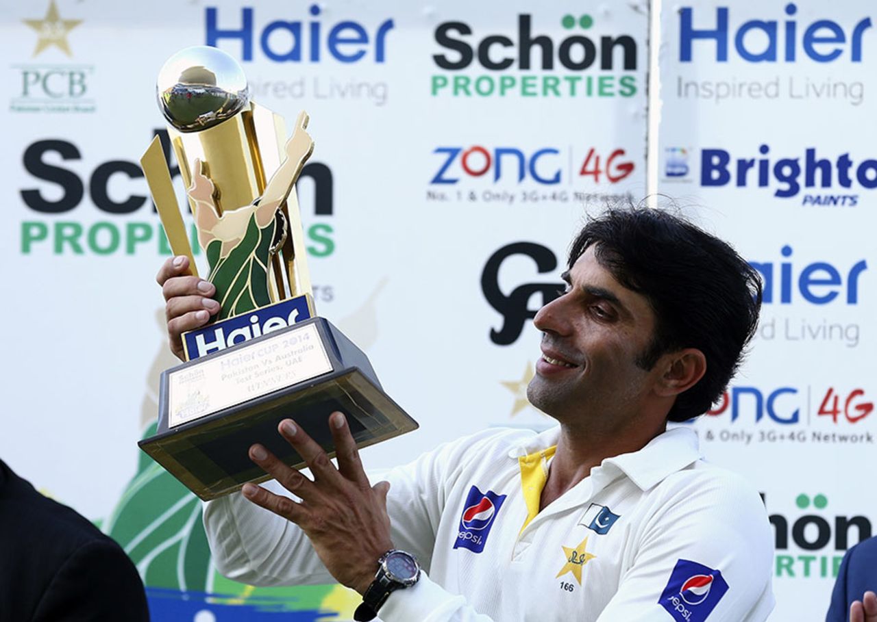 A smiling Misbah-ul-Haq lifts the trophy after Pakistan wrapped up the series 2-0, Pakistan v Australia, 2nd Test, Abu Dhabi, 5th day, November 3, 2014