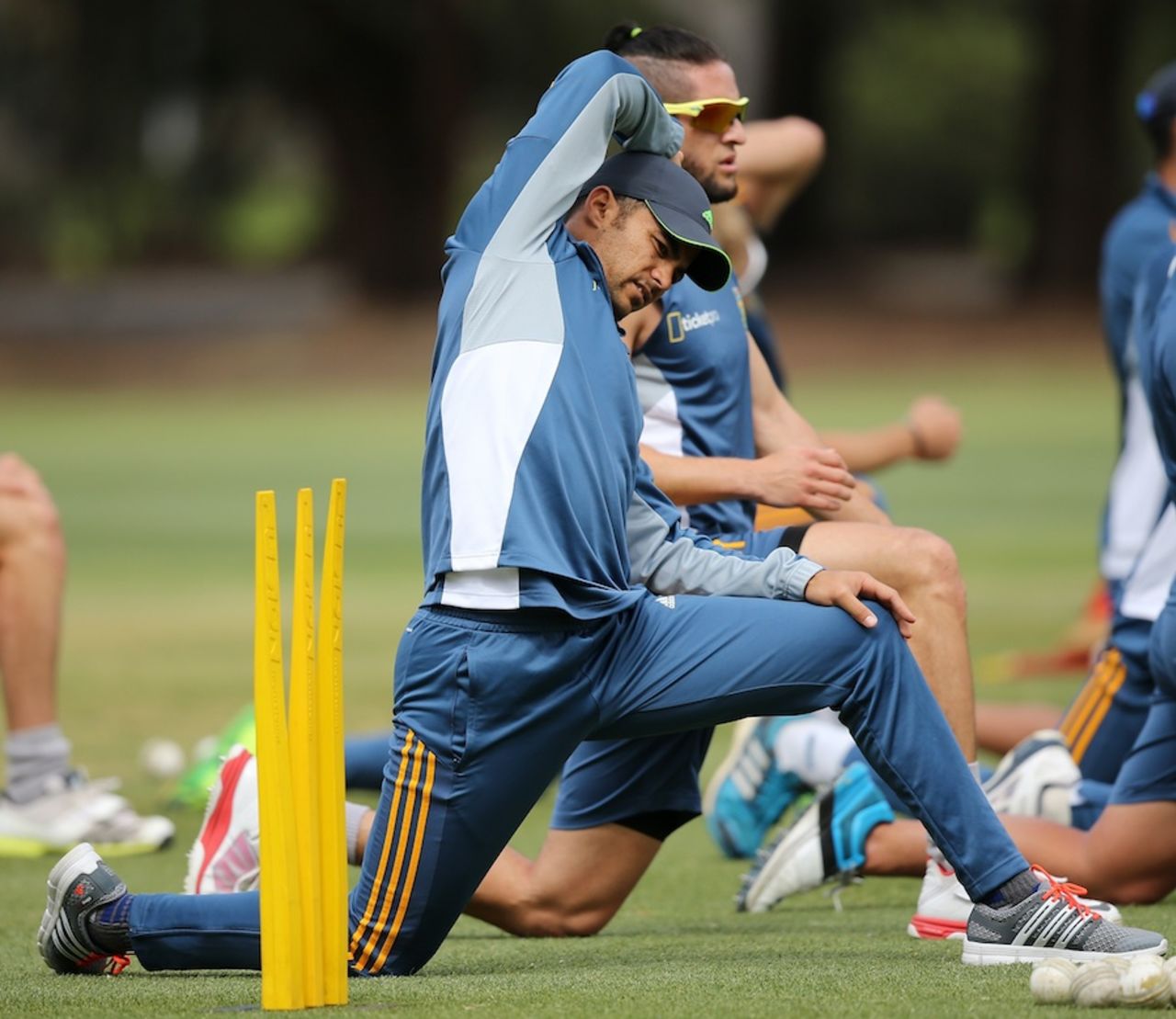 JP Duminy stretches before a training session, Adelaide, November 4, 2014