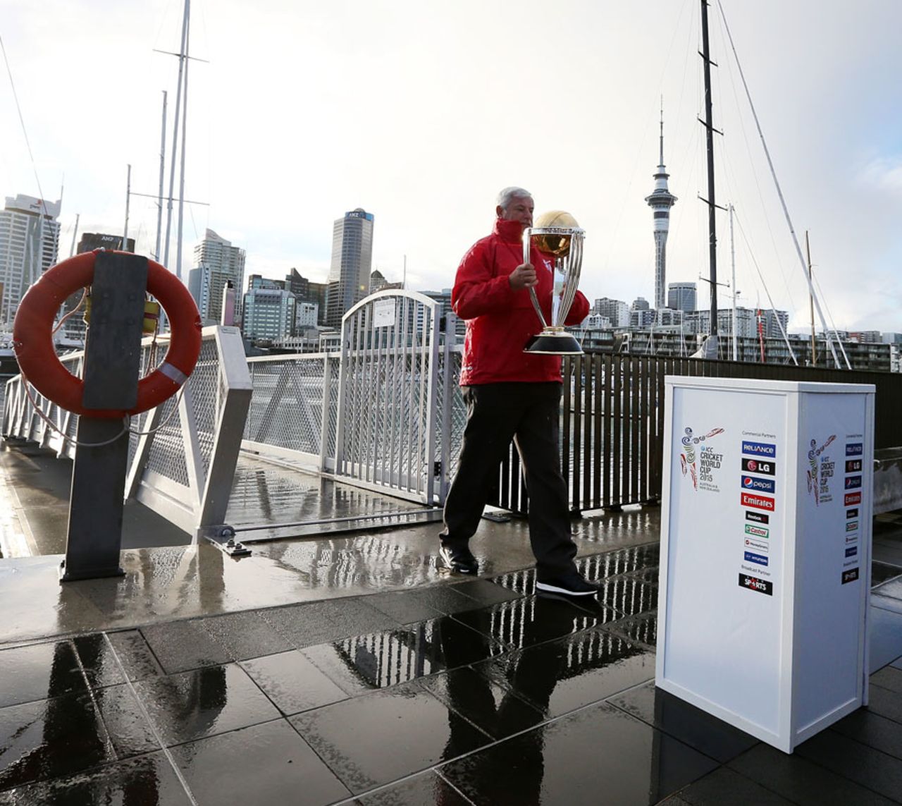 Richard Hadlee arrives with the trophy to Wynyard Wharf during an event marking the 100-day countdown to the World Cup, Auckland, November 6, 2014