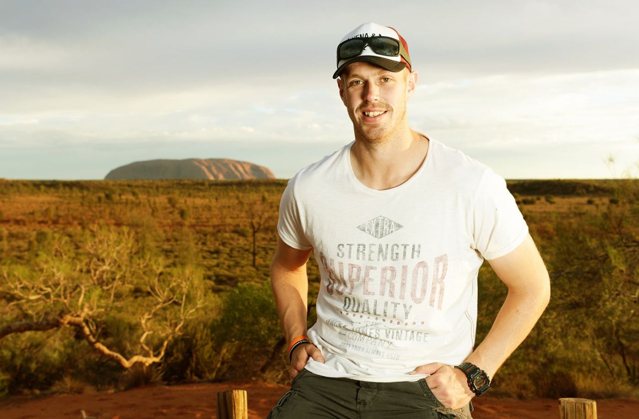 Boyd Rankin poses in front of Uluru, Ayers Rock, November 26, 2013