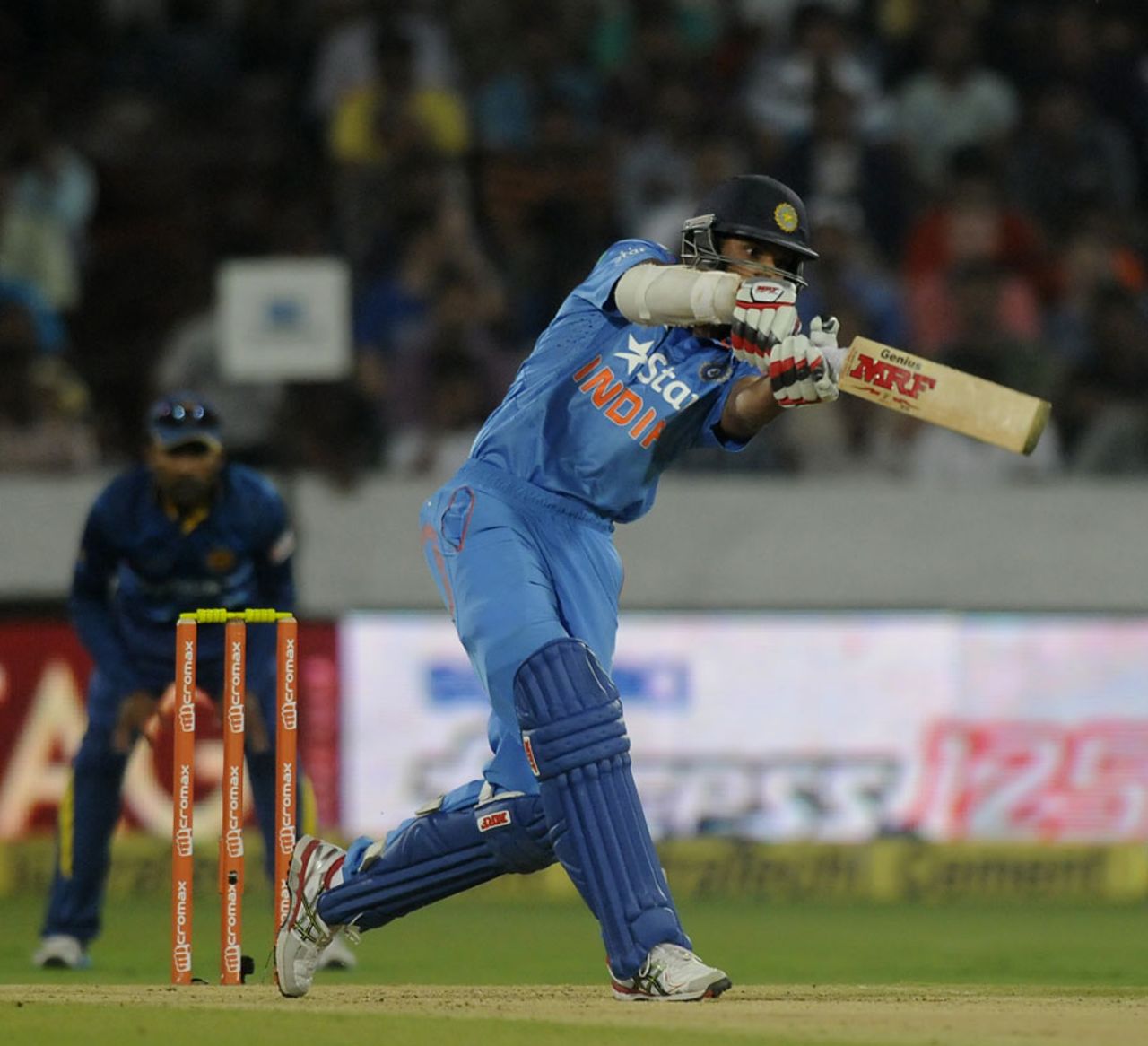 Shikhar Dhawan steps out for a hit, India v Sri Lanka, 3rd ODI, Hyderabad, November 9, 2014