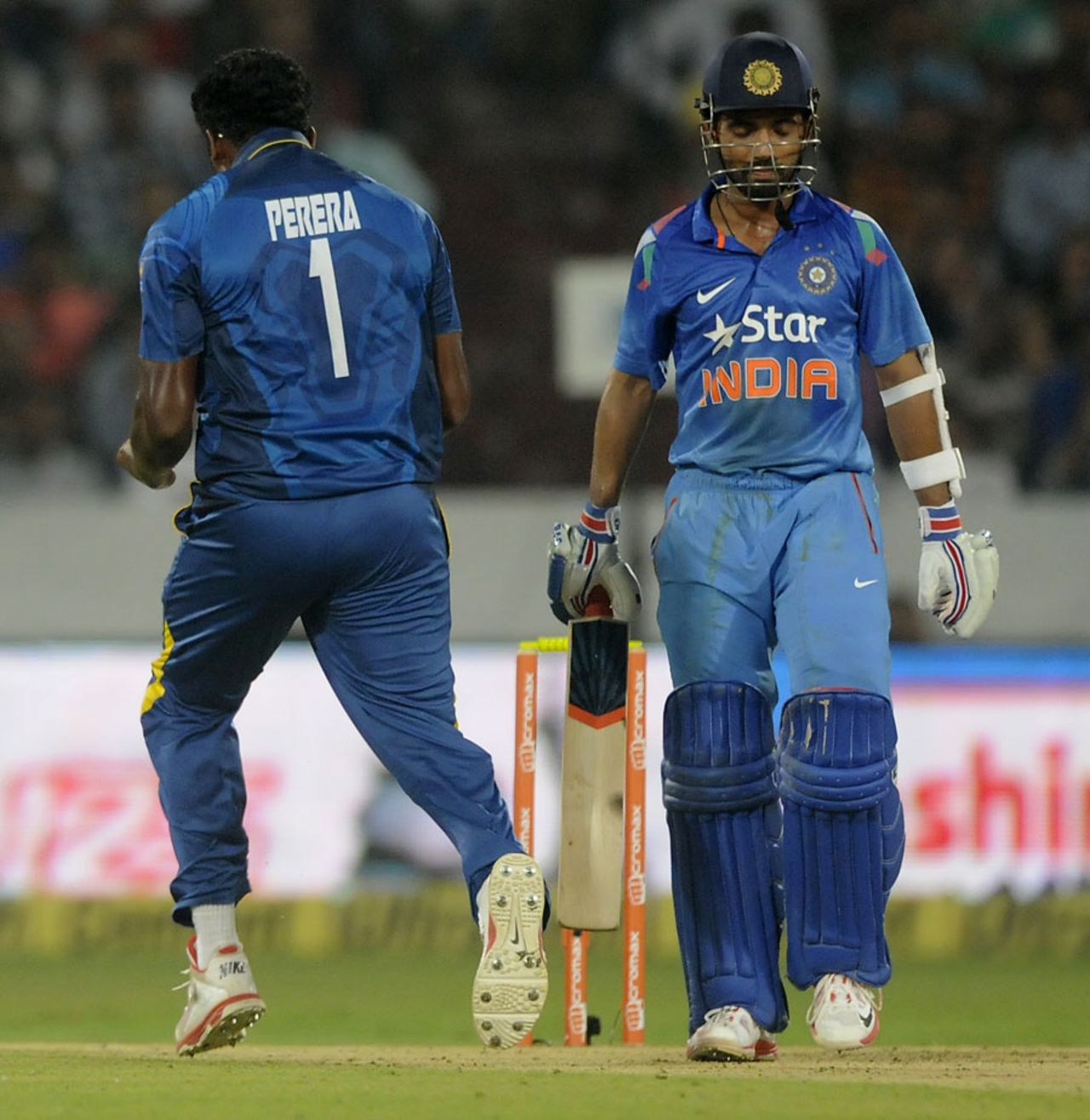 Thisara Perera exults after getting Ajinkya Rahane, India v Sri Lanka, 3rd ODI, Hyderabad, November 9, 2014