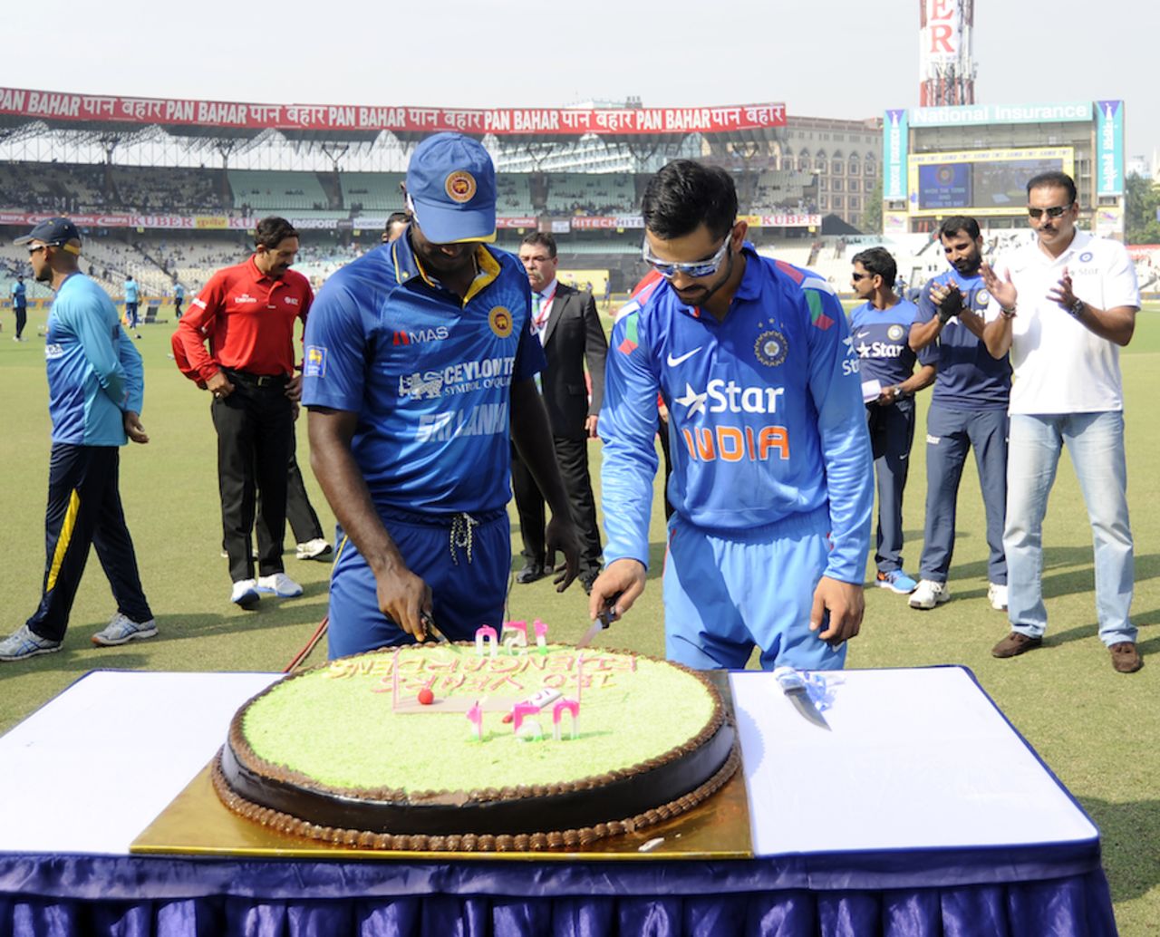 Angelo Mathews and Virat Kohli cut the Eden Gardens 150-years celebration cake, India v Sri Lanka, 4th ODI, Kolkata, November 13, 2014