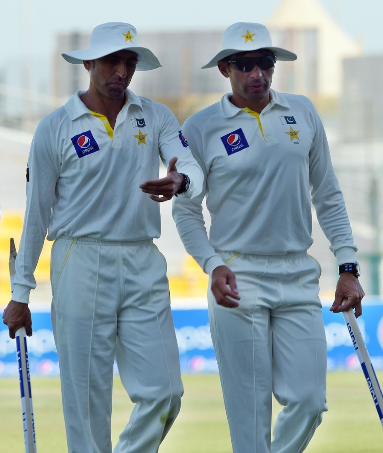 Younis Khan and Misbah-ul-Haq walk off after the victory, Pakistan v New Zealand, 1st Test, Abu Dhabi, 5th day, November 13, 2014