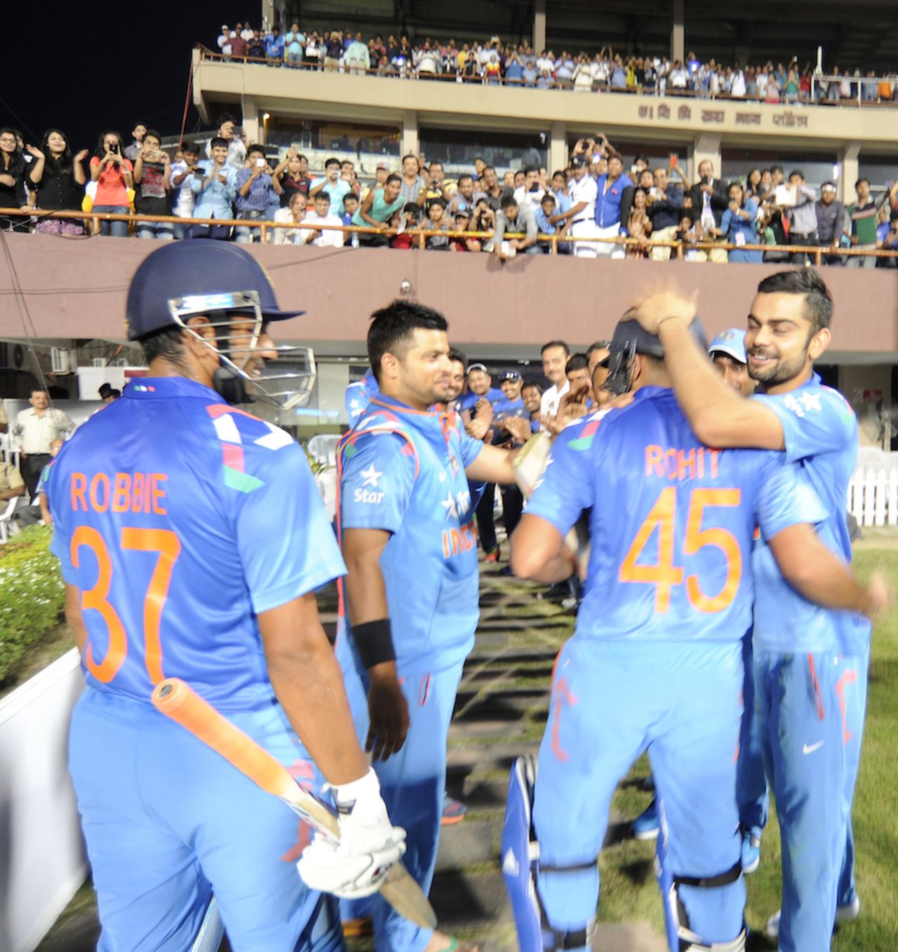 India team greets Rohit Sharma at the end of the innings, India v Sri Lanka, 4th ODI, Kolkata, November 13, 2014