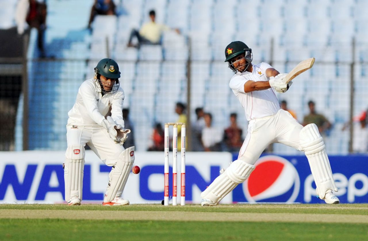 Sikandar Raza cuts on his way to fifty, Bangladesh v Zimbabwe, 3rd Test, 2nd day, Chittagong, November 13, 2014