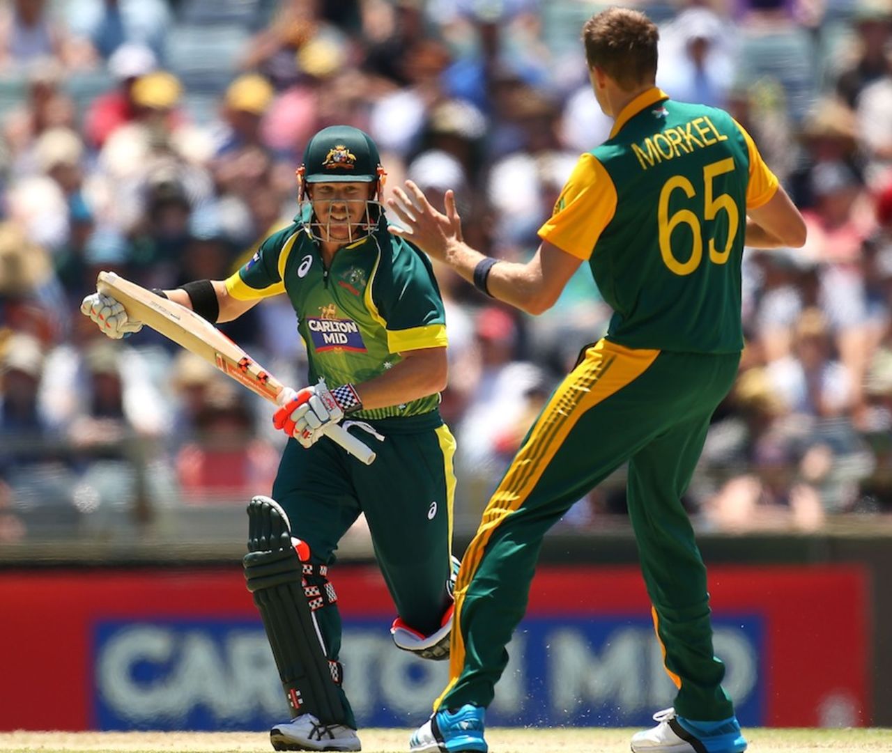 David Warner and Morne Morkel avoid a collision, Australia v South Africa, 1st ODI, Perth, November 14, 2014