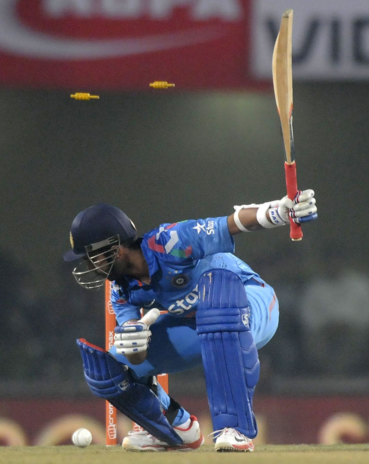 Ajinkya Rahane crouches back to see his stumps splayed, India v Sri Lanka, 5th ODI, Ranchi, November 16, 2014