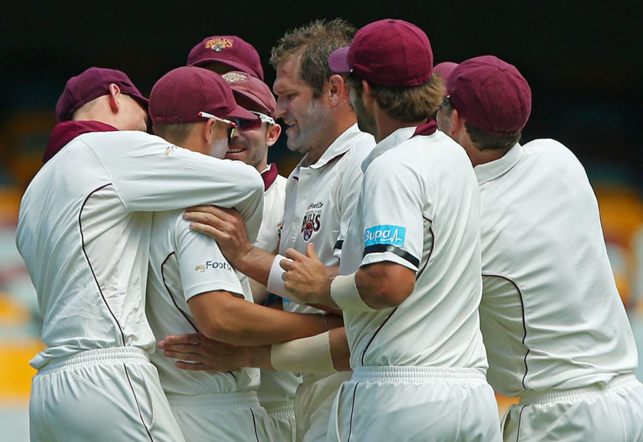 Ryan Harris celebrates the wicket of Ryan Carters, Queensland v New South Wales, Sheffield Shield 2014-15, 2nd day, Brisbane, November 17, 2014