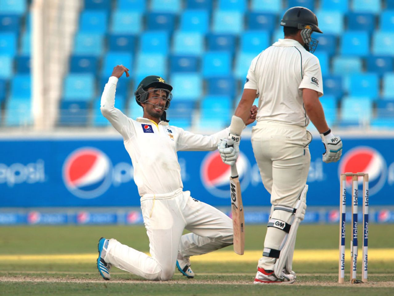 Shan Masood celebrates after taking a smart catch to dismiss Ross Taylor, Pakistan v New Zealand, 2nd Test, Dubai, 1st day, November 17, 2014