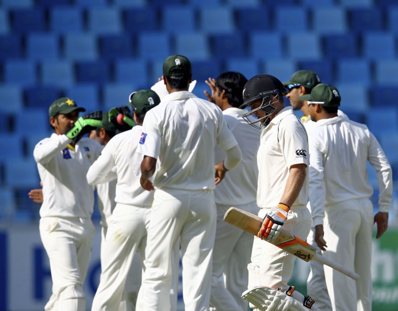 Tom Latham walks back after being dismissed for 137, Pakistan v New Zealand, 2nd Test, Dubai, 2nd day, November 18, 2014