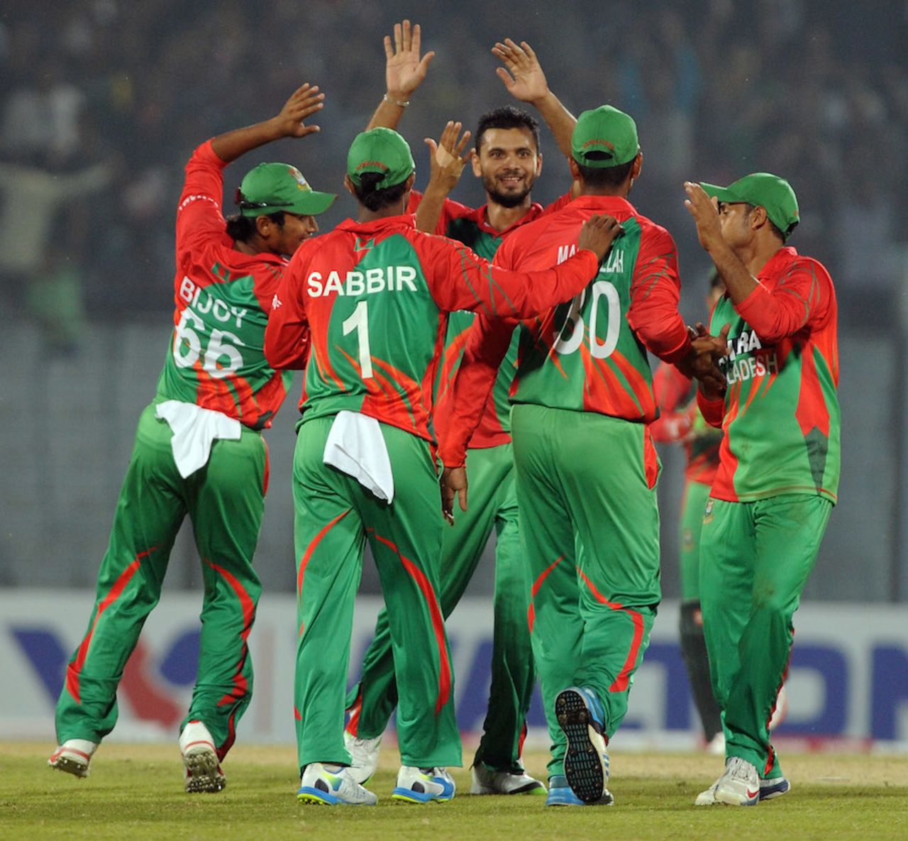 Mashrafe Mortaza is congratulated by team-mates after a wicket , Bangladesh v Zimbabwe, 2nd ODI, Chittagong, November 23, 2014