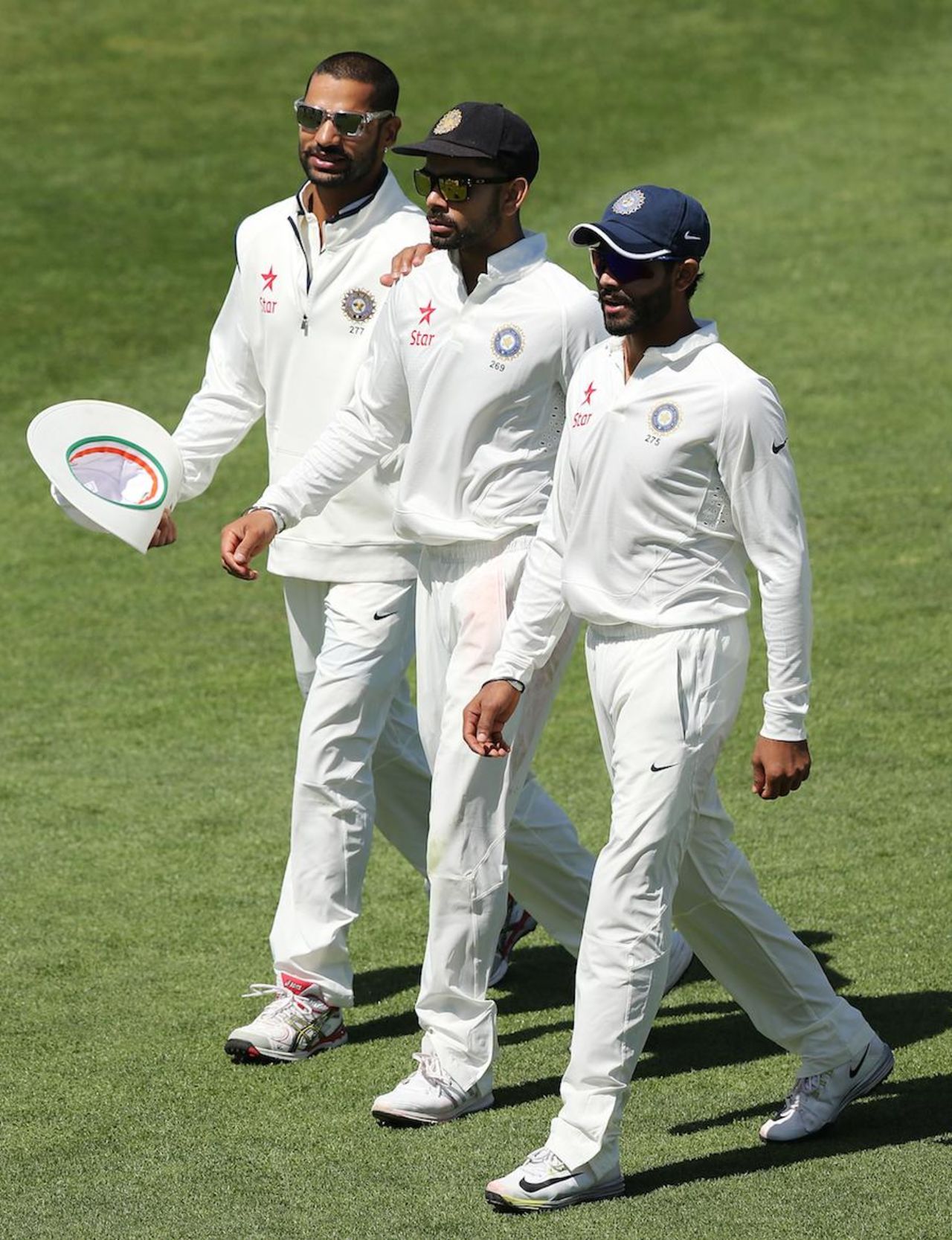 Shikhar Dhawan, Virat Kohli and Ravindra Jadeja walk off the field, Cricket Australia XI v Indians, Gliderol Stadium, Adelaide, 1st day, November 24, 2014