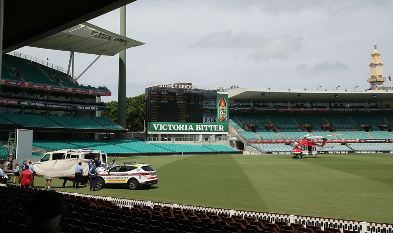 Road and air ambulances arrive at the SCG, New South Wales v South Australia, Sheffield Shield, Sydney, 1st day, November 25, 2014