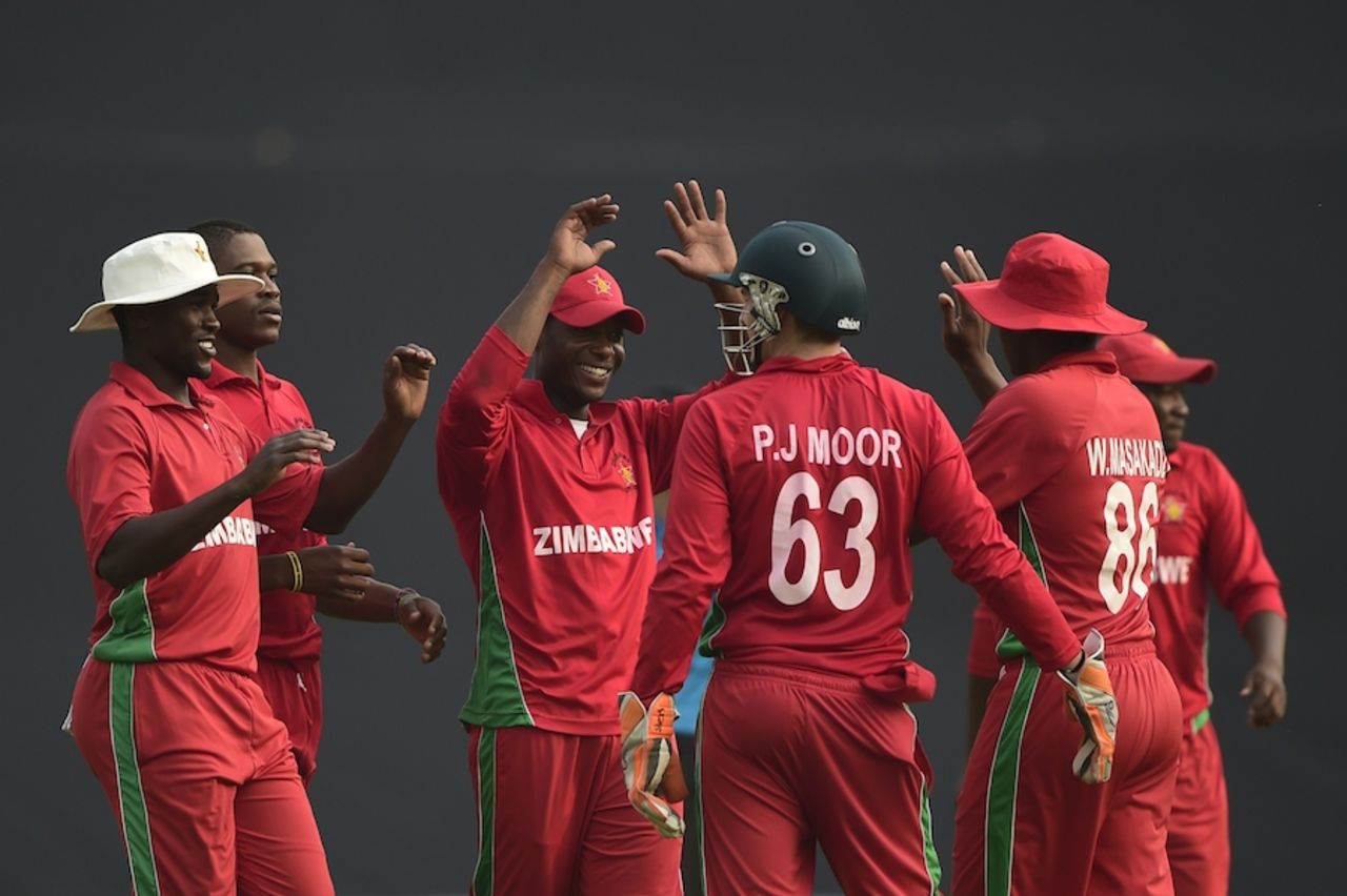 Zimbabwe players celebrate a fall of wicket, Bangladesh v Zimbabwe, 3rd ODI, Mirpur, November 26, 2014