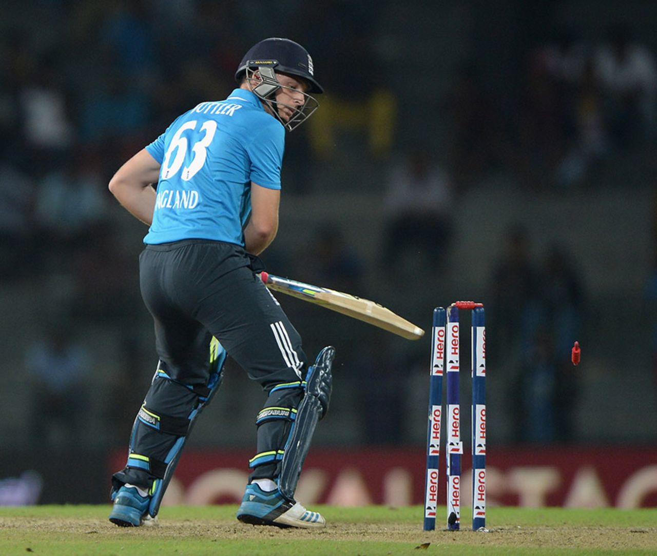 Jos Buttler dragged into his stumps after a brief flurry, Sri Lanka v England, 1st ODI, Colombo, November 26, 2014