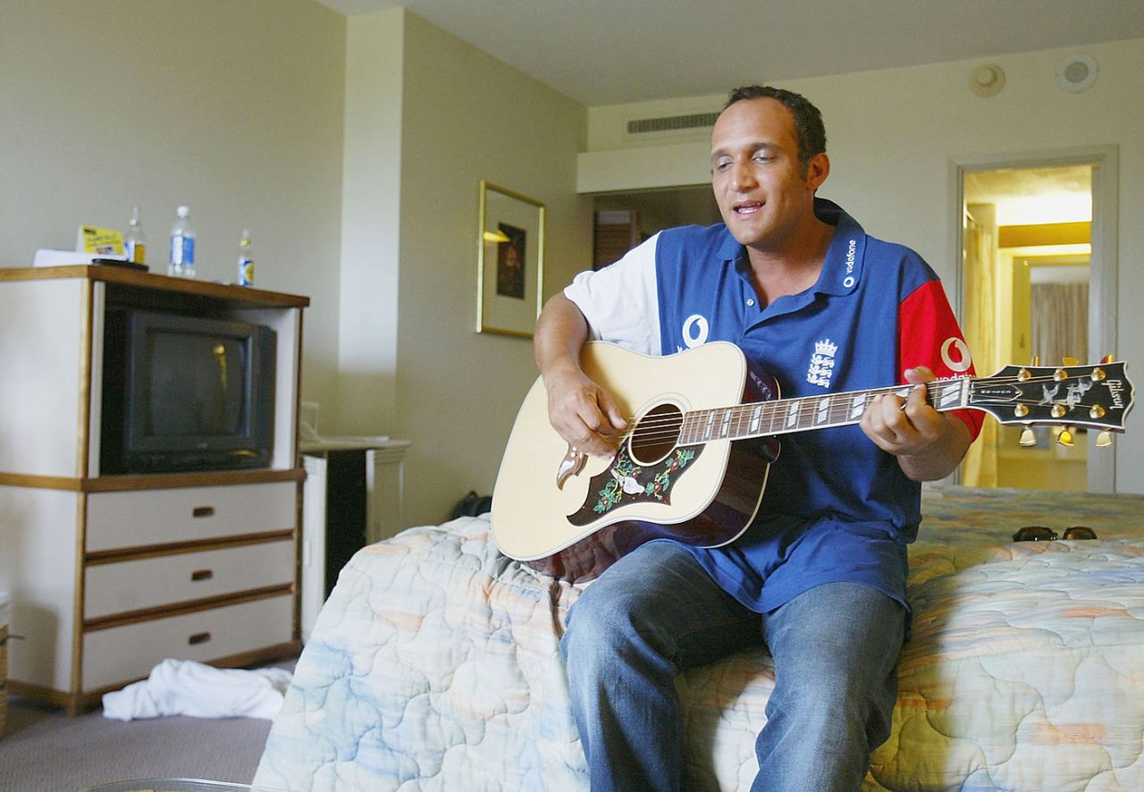 Mark Butcher plays the guitar, Barbados, March 24, 2004