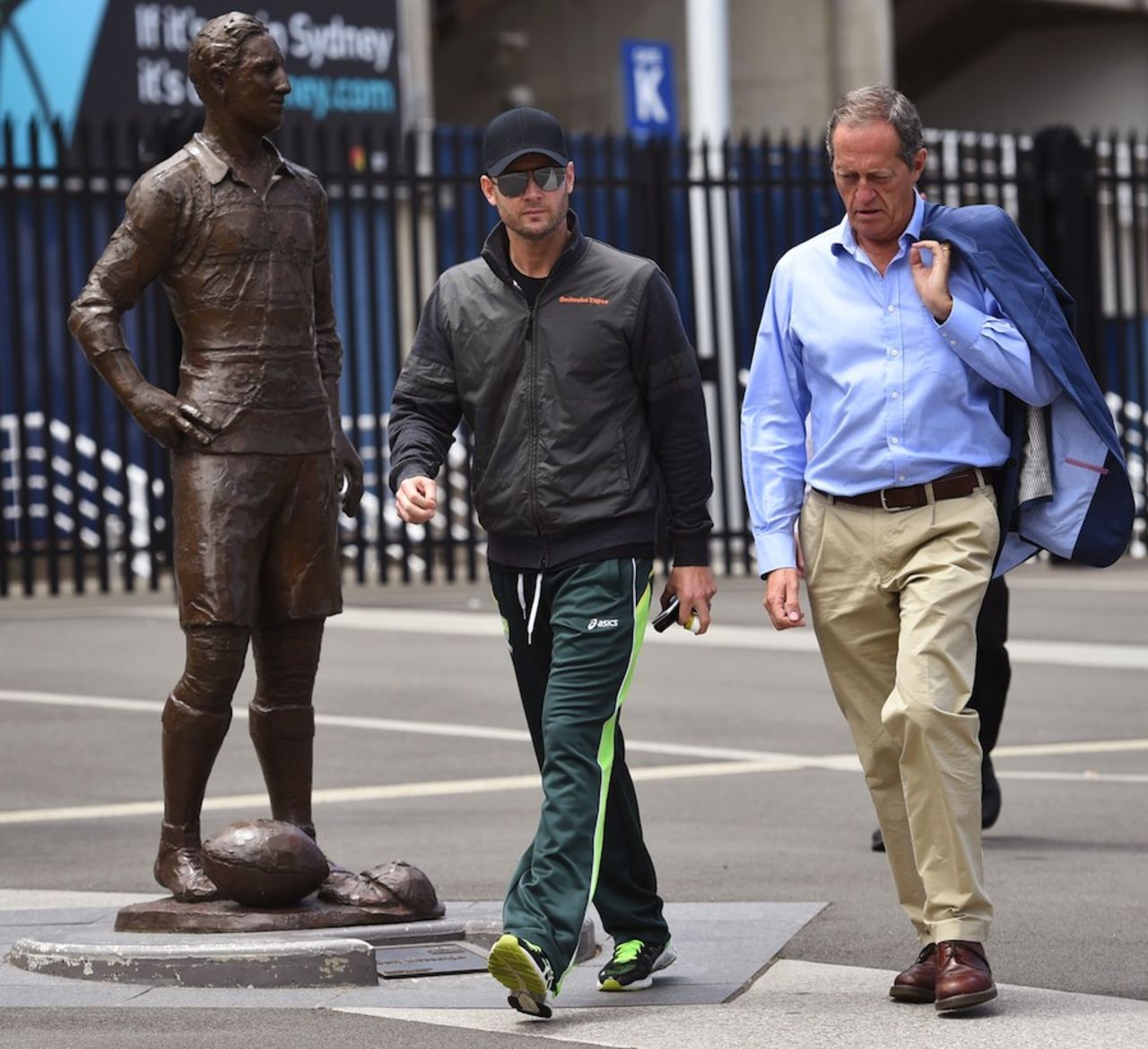 Michael Clarke and Cricket Australia doctor Peter Brukner at the SCG, the day after Phillip Hughes death, Sydney November 28, 2014