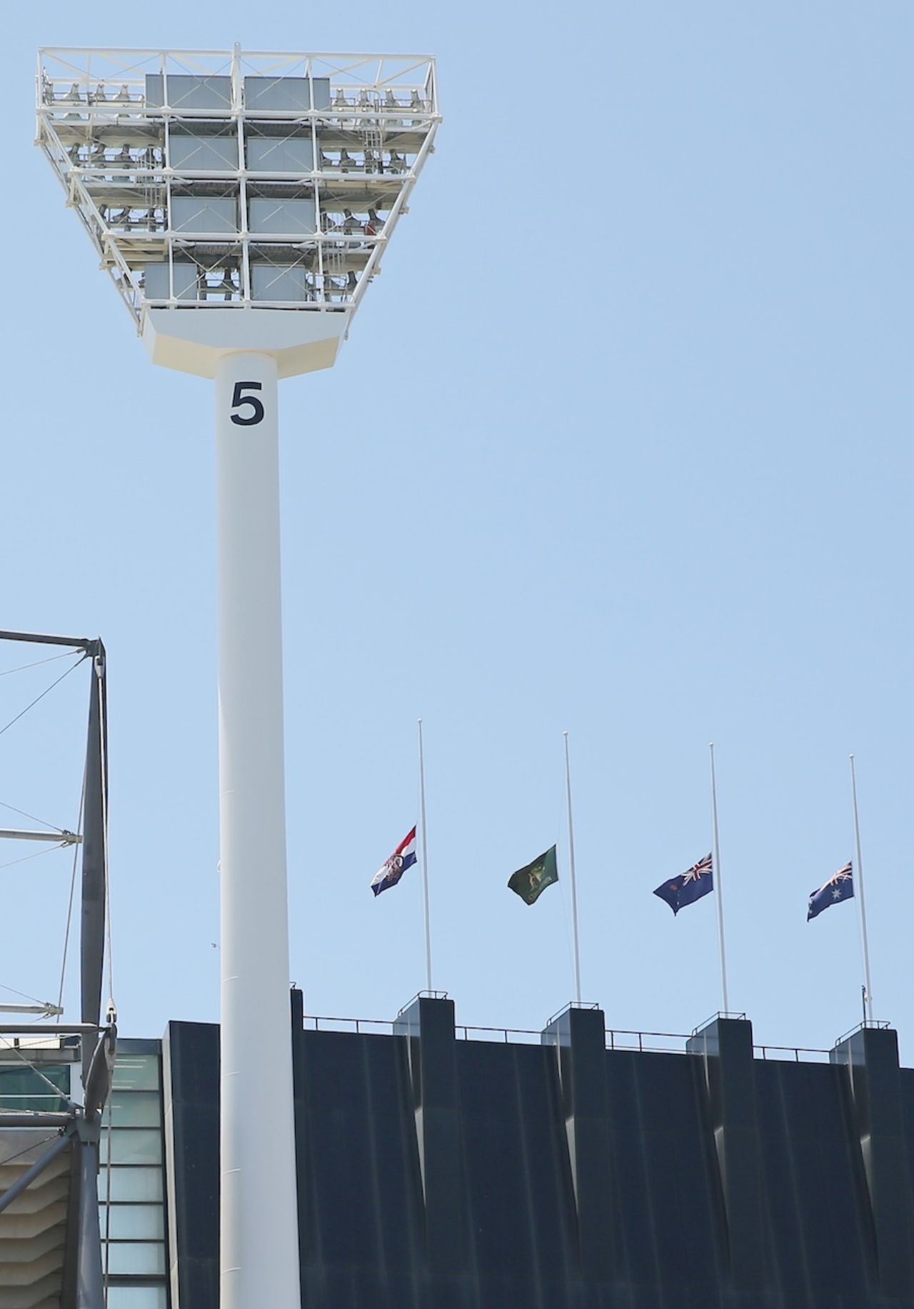 Flags fly at half mast at the MCG, Melbourne, November 28, 2014
