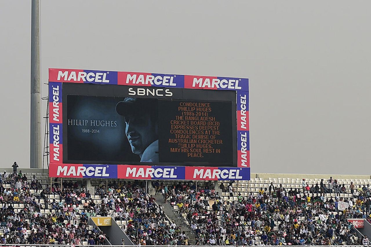 Spectators in Mirpur observe a minute's silence in tribute to Phillip Hughes, Bangladesh v Zimbabwe, 4th ODI, Mirpur, November 28, 2014